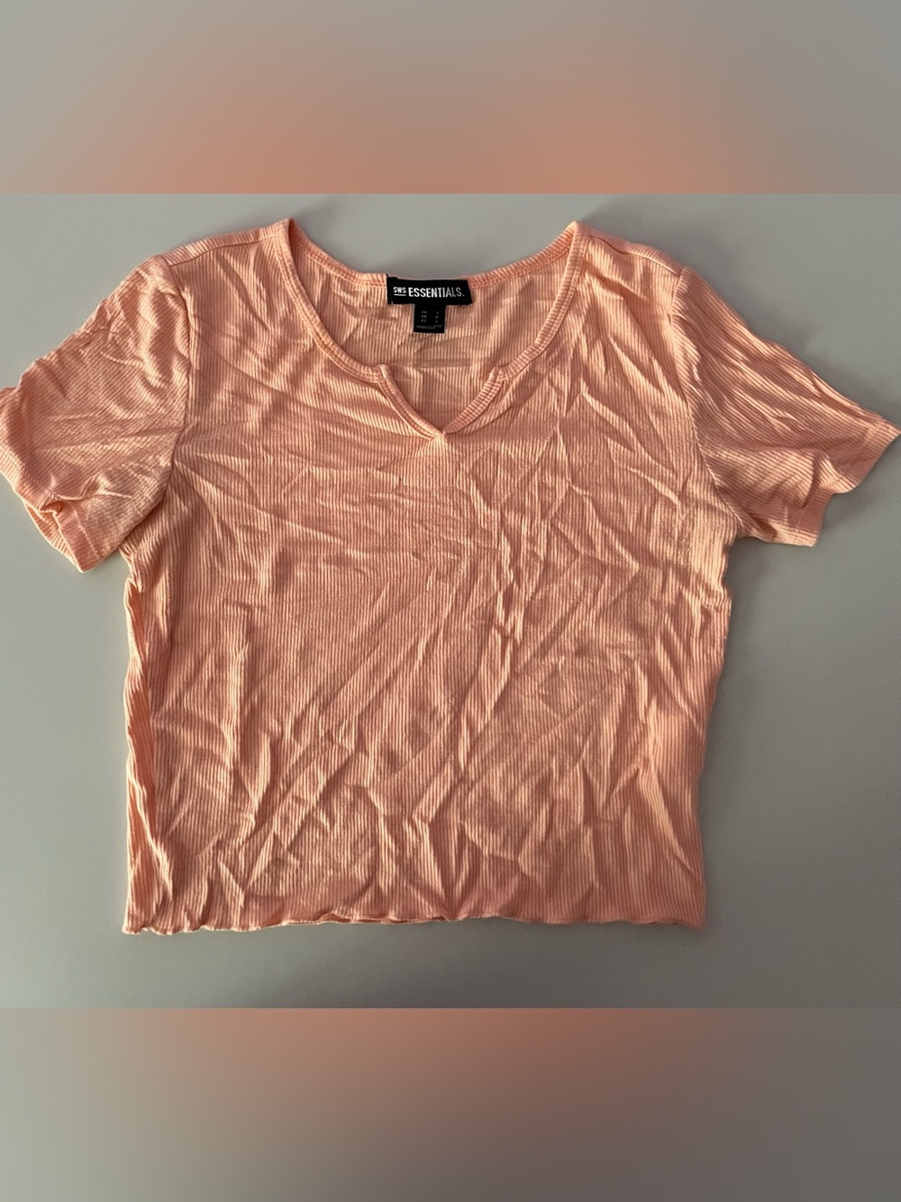 Essentials Women's Peach Ribbed V-Neck Crop Top